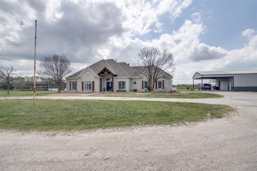 This spacious 4-bedroom, 3.5-bathroom home offers 2,732 sq. ft. of living space on 11.2 acres in a beautiful country setting with no restrictions all while being situated in the sought after Caddo Mills ISD school district.
Designed for both comfort and function, the home features open living areas perfect for entertaining, along with a large cedar patio cover overlooking a sparkling pool and private stocked pond.
For those who need extra space, the property includes an 30x40 insulated shop with a wood-burning stove and a half-bathroom along with a 30x30 three-stall barn with storage room and running water, perfect for your horses or farm animals. Ag exemption in place.
Whether you’re looking for room to grow, a place for animals, or just quiet country living with modern amenities, this property has it all. Don’t miss your chance to experience true Texas living at its best.