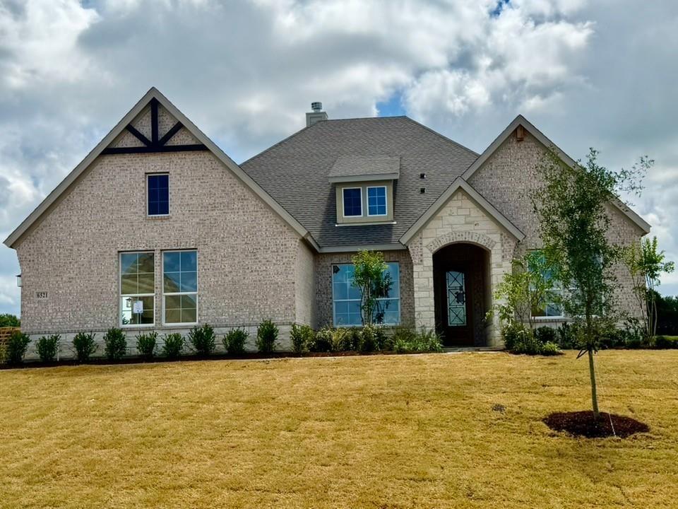 Estimated July 2026 completion! Ask us about our Trade In Trade Up program, we can buy your home! The Verbena floor plan features a modern, open-concept layout and the sought-after features today’s homeowners are searching for. With four bedrooms, three bathrooms, and a flex room, this plan boasts just over 2,400 square feet of functional living space. Upon entering the home off the front porch, you’re welcomed by an inviting foyer. Immediately to the left is a hallway with a bedroom, walk-in closet and full bathroom, as well as a linen closet. Across the foyer is a flex room, perfect for a home office, formal dining room or whatever need your family has for the space. Past the foyer is the family entry, with storage space and mud bench, which leads to the laundry room and two or three car attached garage. Through the entrance, the home opens up to a large family room with a stately fireplace. Adjacent to the family room is a gourmet kitchen, equipped with a walk-in pantry, ample counter space and an oversized island. Finishing off this open-concept living area is a dining space which overlooks the covered back patio. The remainder of this one-story floor plan is just off the living space. A hall leads to two bedrooms with walk-in closets, another linen closet and a shared full bathroom. The back corner of the home offers privacy for the owner’s suite, featuring a massive walk-in closet and bathroom with a dual-sink vanity, standalone soaking tub and glass-enclosed shower.