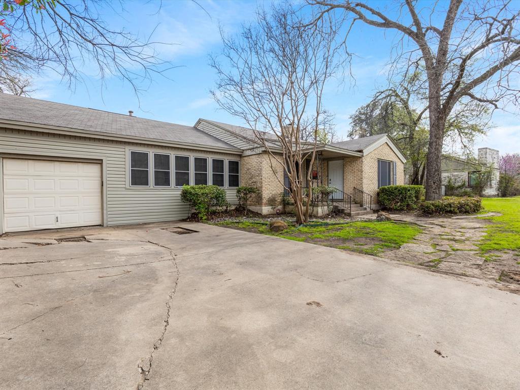 Location! Location! Location! Home is located in the TCU Overlay-Grandfathered currently for 5 tenants.  New owner would need to re-register within 10 days of purchase to maintain grandfathered status. One-story home in close proximity to TCU, restaurants, Foster Park, Trinity Trails & grocery store. Prime location and charming details in the current floorplan or an ideal homesite for a new build. Lots of great storage, kitchen island, decorative fireplace and large backyard space are just some of the items to note!