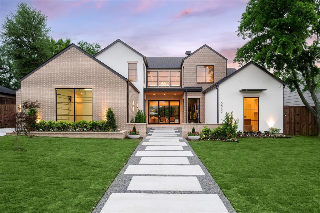 Developed by Arneson Homes, 6632 Azalea Lane is a refined new construction residence in the heart of Preston Hollow, offering 6,684 square feet of thoughtfully designed living on an expansive 100 x 157 lot.
The striking exterior blends brick and smooth stucco with clean rooflines and steel-framed windows, creating a timeless yet modern presence. Inside, soaring ceilings, wide-plank hardwoods, and walls of glass define the home’s architectural character while filling the spaces with natural light.
The kitchen is both sculptural and functional, anchored by a statement stone island and supported by a butler’s pantry and separate back kitchen for seamless entertaining. The open living areas flow effortlessly to the covered patio and backyard, designed for year-round enjoyment.
With 5 bedrooms, 5 .2 baths, the layout includes a private office, double game rooms, a flex space, and a 3-car garage. The primary suite serves as a true retreat, featuring vaulted ceilings and a spa-inspired bath with a freestanding tub, a steam shower  and warm layered finishes.
The covered patio extends the main living areas into a true outdoor retreat, overlooking a resort-style pool and private backyard setting designed for both relaxed afternoons and elevated entertaining. Tucked just beyond, the flex room offers a unique layer of versatility with its own bath and direct access to the patio, making it ideal as a poolside lounge, fitness studio, guest suite, or private retreat seamlessly integrating indoor comfort with outdoor living.