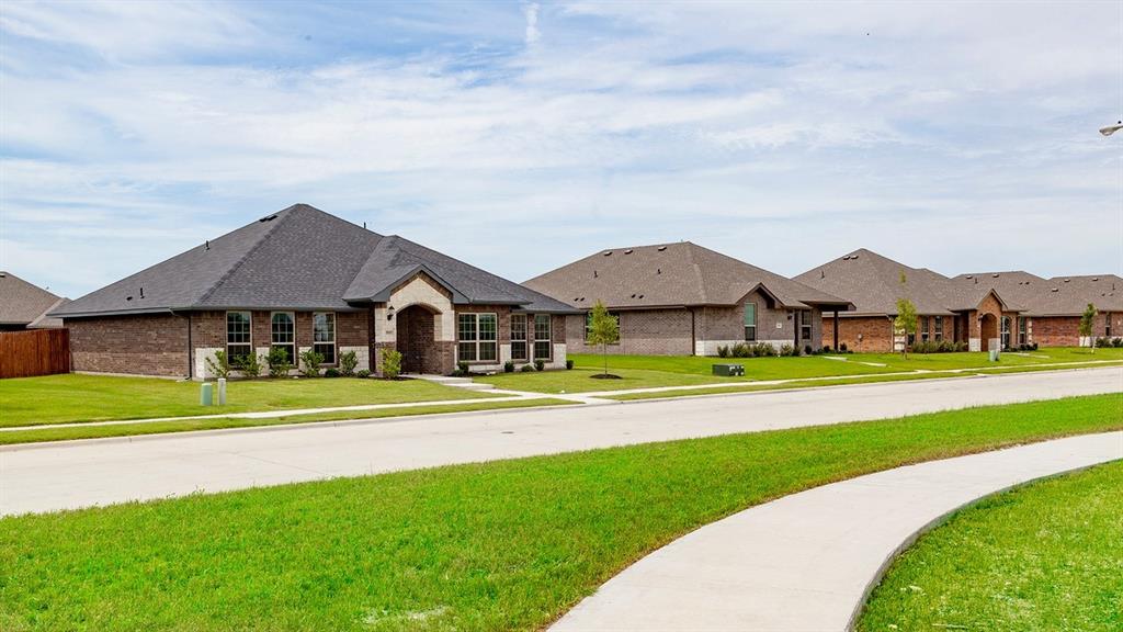 MLS# 21293689 - Built by Camden Homes LLC - Jul 2026 completion! ~ Traditional 3-bedroom, 2-bath single-family home under construction in Camden Park Estates. Estimated completion 7-15-2026. 1,740 sq ft with 2-car garage, open living and dining areas, luxury vinyl plank floors, granite counters, pantry and walk-in closet(s). ENERGY STAR electric central heat and air with ceiling fans. Slab foundation, composition roof and rain gutters. Located in Waxahachie ISD (Oliver Clift Elementary, Waxahachie High). Construction stage: incomplete.