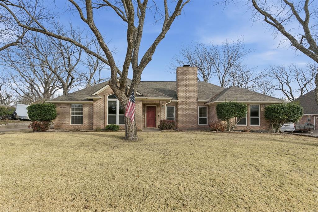 Move-in ready and beautifully refreshed in the highly sought-after gated community of Pecan Plantation in Granbury! This well-maintained 3-bedroom, 2-bath home with a dedicated office or formal dining space offers a functional layout paired with thoughtful updates throughout. All wallpaper has been removed and the home features fresh interior paint, creating a clean, modern feel, along with new windows that enhance natural light and energy efficiency. The split-bedroom floorplan provides privacy, while the spacious living area flows seamlessly into the oversized kitchen featuring a center island, abundant cabinetry, generous counter space, and a walk-in pantry. A cozy breakfast nook overlooks the backyard, and the sun-filled solarium offers additional living space with peaceful views of mature pecan trees—perfect for a reading room, art studio, or relaxing retreat. The primary suite includes an en-suite bath and ample closet space. Secondary bedrooms are well-sized and thoughtfully positioned. A side-entry 2.5-car garage provides extra storage and workspace. Enjoy the unmatched lifestyle Pecan Plantation offers, including golf, tennis, multiple swimming pools, marina access, private airstrip, river parks, and convenient shopping and dining within the community. Lake access to Lake Granbury adds even more recreational opportunities. This home offers the perfect blend of comfort, updates, and lifestyle in one of North Texas’ most amenity-rich communities.
