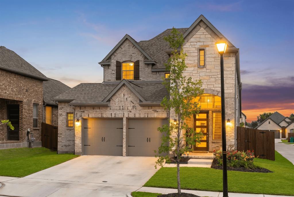 PRICED TO SELL FAST… ROCKWALL ISD!  This stylish Chesmar Home DURHAM PLAN has the 5th bedroom, 3rd bathroom upgraded option plus sleek electric glass rock fireplace.  It’s ABSOLUTELY STUNNING and a MUST SEE!  Upon arrival, you'll notice the striking drive-up appeal created by the property's combination of brick, trim, and stone colors, alongside expertly designed landscaping. As you enter, you'll be drawn in by the foyer and living area with lofty ceilings, bathed in natural light. The kitchen is dreamy with not only a large breakfast bar, but also an island, gas range, beautiful built-in cabinetry, and open to both the family room and the dining area. Also downstairs, there’s a spacious primary bedroom with an ensuite bath and walk-in closet, plus another bedroom that could serve as a study or flex room, located near a second full bath and separate laundry room. Upstairs, enjoy the game room, 3 additional large bedrooms, and a full bathroom all with 9’ to 10’ ceilings.  Step outside and enjoy the Texas weather. Exterior backyard features include a huge, fenced yard with some trees, gas line for grilling, outdoor mounted speakers, and covered back patio. The 2.5 car garage is oversized to provide extra room for storage or a workshop. Additional perks include exterior camera system, sprinkler system, gutters, zoned HVAC for energy efficiency, and so much more! The Sellers love the natural light that comes from the windows of this home, the versatile floor plan, and the location of this home. This one is ready for you, so don’t wait to build… buy now!