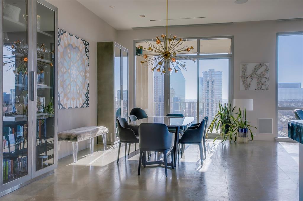 Luxury one of a kind Three bedroom floor plan with panoramic views in this Lionel Morrison iconic One Arts High rise..  Sub Penthouse No apt above you or on any of all three sides of this home. Totally reimagined and remodeled apt with large entry foyer for art. Open plan oversized Living and Dining room with incredible views of Downtown Arts District and west all the way to Love Field, Uptown and Klyde Warren Park. Remodeled open plan Bulthaup kitchen anchors this incredible space. Custom metal and glass door gives privacy to the Third bedroom or study. Master suite is totally self contained with custom walnut closet that looks like it's out of a high-end boutique. Updated Master bath with steam and body jet shower, and private commode area with self washing toilet. Second bedroom with custom lacquered closets and ensuite. Guest Powder room and Laundry room with built in Miele coffee machine. Venetian plaster walls and custom paints, sound system, Lutron lighting system, new electric blinds and custom sheers.The Next Move is yours.