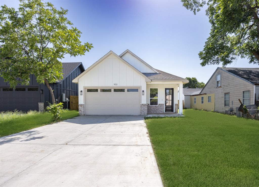 Welcome to this beautifully crafted new construction home featuring a bright, open-concept floor plan with soaring vaulted ceilings, luxury vinyl plank flooring, and abundant natural light throughout. The stylish kitchen is designed for both everyday living and entertaining, offering a large quartz island, custom cabinetry, designer backsplash, stainless steel appliances, elegant gold accents, and generous storage space. The spacious primary suite provides a peaceful retreat with a tray ceiling, a large walk-in closet with built in shelving, and a luxurious ensuite bathroom. The spa inspired walk in shower features floor to ceiling designer tile, a frameless glass enclosure, built in niche, and modern fixtures. Additional bathrooms are thoughtfully finished with custom tilework, quartz countertops, and coordinated designer details. Outside, enjoy a large, fully fenced backyard with plenty of space for entertaining, pets, gardening, or creating your ideal outdoor living area. The spacious side yard offers ample room for vehicle access, making it ideal for parking a trailer, boat, or other recreational vehicles Attached two-car garage, energy-efficient construction, recessed lighting, modern fixtures, and quality finishes throughout. Conveniently located near shopping, dining, schools, and major highways, this move-in-ready home offers the perfect combination of comfort, style, and functionality. Schedule your private showing today!