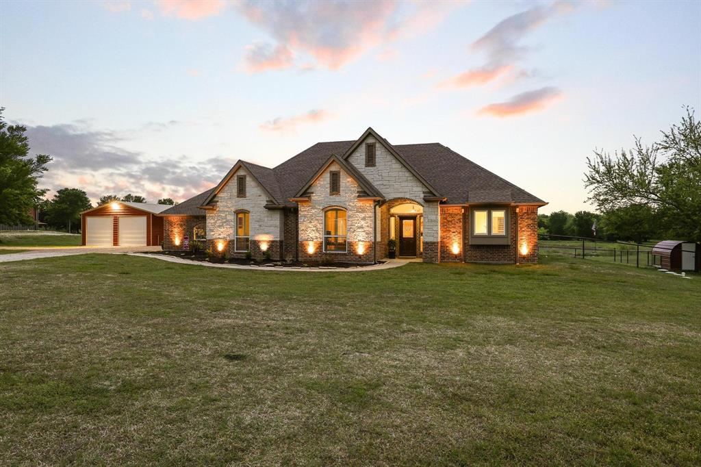 Welcome to Brushy Creek Ranch Quinlan, TX

This 3 bedroom, 2.5 bath home features an open floor plan with expansive back windows, a wood burning fireplace, and seamless access to a covered patio ideal for year-round enjoyment. The recently remodeled kitchen showcases custom cabinetry, Thor appliances and updated tile and hardwood flooring throughout.

Outdoors, the property has been carefully curated for both recreation and functionality. A 30x45 insulated shop with a 12x30 lean-to includes concrete floors, drainage, and electric, while French drains have been installed around key improvements. A newly added 12x24 oval swimming pool with deck creates a private retreat, complemented by a covered cook shack with electric.
The land itself is what truly sets this property apart. A stocked half-acre pond offers fishing for bass, catfish, crappie and bluegill, while a spring-fed wetland area attracts mallards and wood ducks, complete with established duck boxes. Food plots, supplemental protein feeders and maintained trails support abundant wildlife, with deer harvested in the 120-150 class. Multiple food plots have been planted with annual rye, cereal rye, winter peas, hairy vetch, apache arrow leaf and dixie crimson clover, another with cereal rye, assorted brassica and clover. The back pond is planted annually with Japanese Millet and Rice for migratory fowl.
Additional features include raised garden beds, a fully equipped “fuzzy butts” chicken coop with solar lighting and secure fencing, and towering generational oaks throughout the property. At the back, Brushy Creek flows quietly through untouched timber, creating a setting that feels both private and timeless. 
A true sportsman’s retreat with the comfort of home. Motivated Sellers, will consider all offers!
