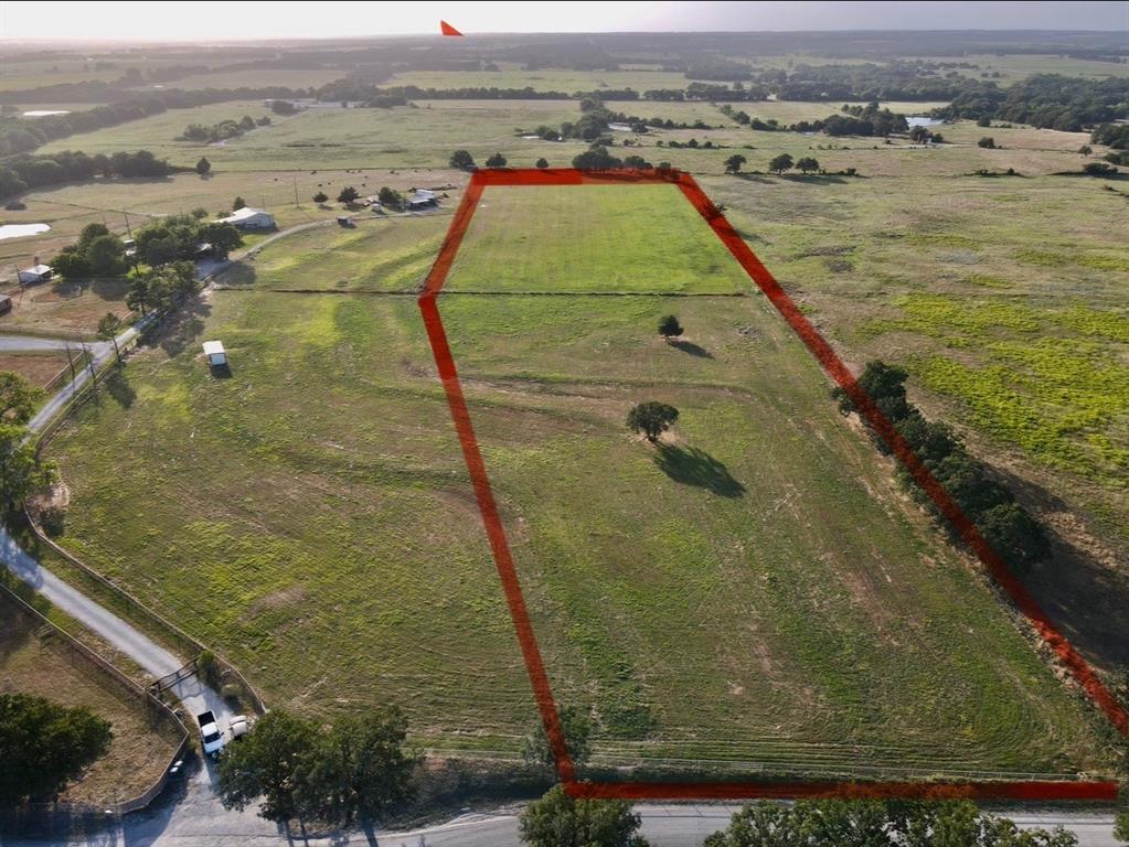 12 Acres of premium land with paved road. Excellent building site. Great place for horse facilities. Property is partially fenced on three sides. Mostly in coastal grass.
