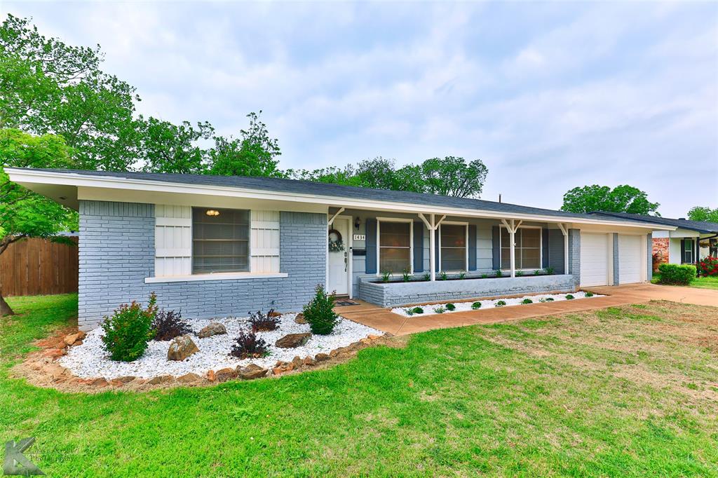 Unbelievably charming, immaculate, 3 Bed, 2 Bath home that has been almost completely redone. New floors throughout, complete kitchen remodel with everything new, floor to ceiling. Check out the granite countertops and notice the new stainless appliances. They all stay! Guest bath is totally new and a fresh face added to the Primary en-suite. New paint on exterior AND interior, new hot water heater and wood privacy fence. The home feels much bigger than its square footage and the two-car garage has new doors with keypad and a bonus tool room for extra storage. Closets are all ample with two large bonus closets in hallway. The tree shaded lot is over one quarter acre and perfect for entertaining with its patio and the alley access is so nice for city services.  Custom ordered fridge will stay as well as the washer and dryer. The whole package!