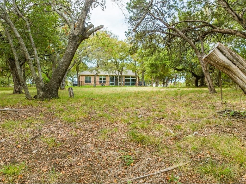 Discover the perfect canvas for your dream home in the serene and prestigious White Bluff Resort community. This stunning land parcel at 16013 Faircrest Dr offers the opportunity to build your ideal oasis in the heart of Whitney, Texas.