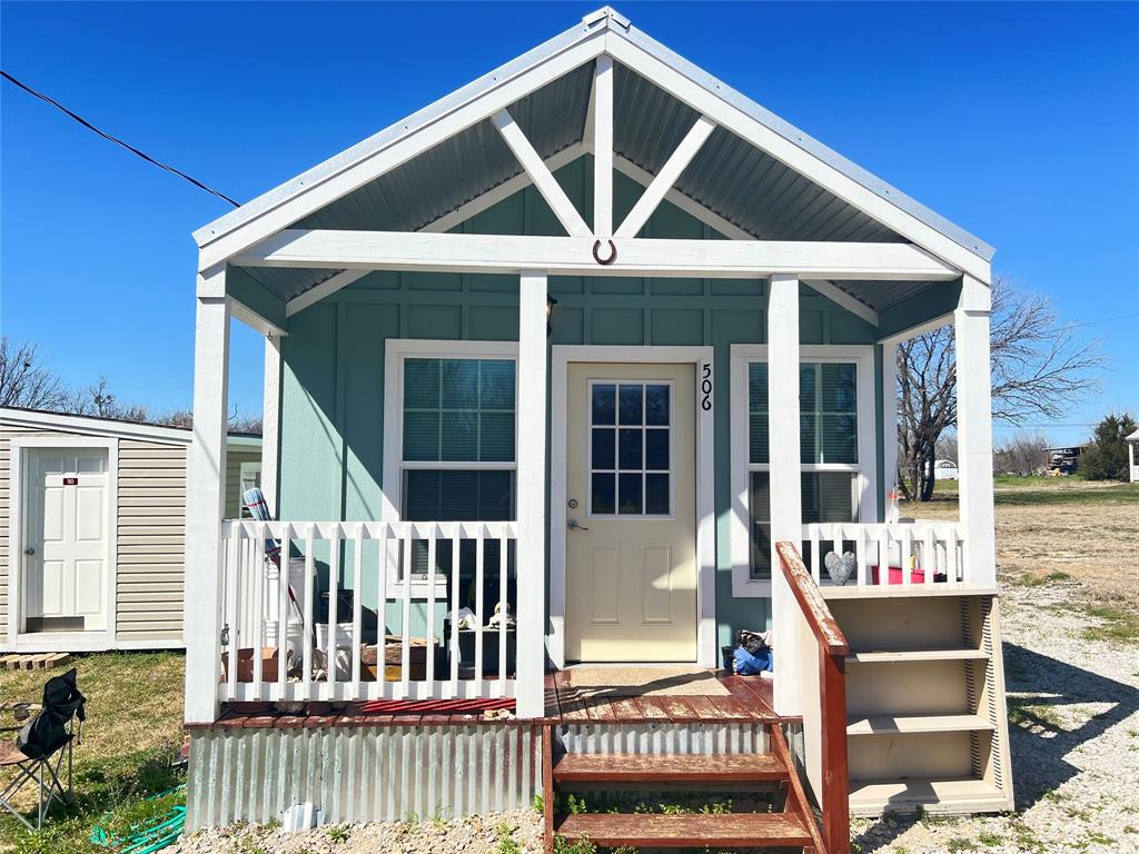 Owner Financing Available 20% Down Payment 10% Interest 12 year note.  Images of interior may not be of the actual subject property. Discover the allure of urban living with this stylish tiny home located in a quiet neighborhood minutes away from HWY 287 for an easy commute to restaurants and boutiques. Thoughtfully designed to maximize space, this modern gem boasts an open concept layout. Unwind in the cozy living area or whip up gourmet meals in the efficient kitchen. Convenient location mixed with contemporary charm, this urban oasis is the perfect place to call home for those who crave seclusion with a touch of sophistication.  Additional land will be surveyed at time of closing to adjoin this parcel.