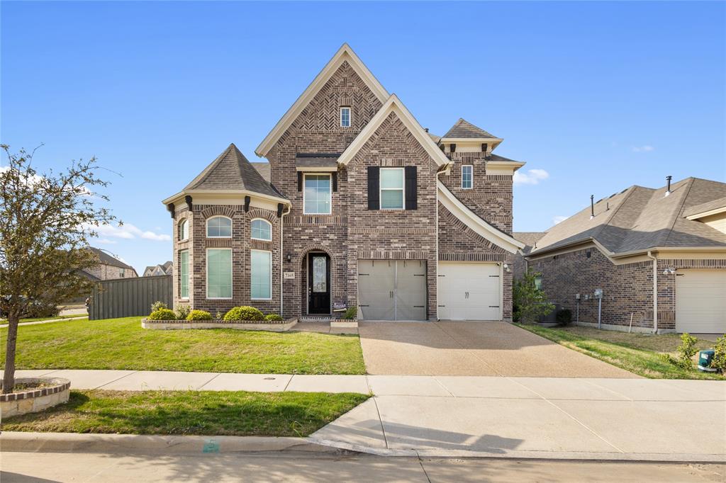 Experience refined living in Prairie Ridge, a sought-after community offering exceptional amenities including a resort-style pool, splash pad, playgrounds, and over 15 miles of scenic hiking and biking trails.
This stunning Tudor-style residence built by Grand Homes showcases timeless architecture with a striking stone exterior and elegant designer finishes throughout. From the moment you enter, you’re welcomed by a dramatic curved staircase with wrought iron spindles, rich hardwood flooring, and custom trim detailing that elevate the home’s sophisticated charm.
Designed for both everyday living and entertaining, the home features a private office, formal dining room, and a breathtaking vaulted family room filled with natural light. A convenient first-floor guest suite offers flexibility for visitors or multi-generational living.
At the heart of the home is the chef-inspired kitchen, beautifully appointed with quartz countertops, light gray shaker cabinetry, stainless steel appliances, a gas cooktop, and an oversized island perfect for gathering and entertaining.
Upstairs, you’ll find a spacious game room and dedicated media room, providing the ultimate space for relaxation, entertainment, and family fun.
The luxurious primary suite offers a private retreat with a spa-inspired bath featuring a freestanding garden tub, creating the perfect space to unwind.
Blending elegant design with modern comfort, this exceptional home offers a lifestyle of comfort, convenience, and community living.