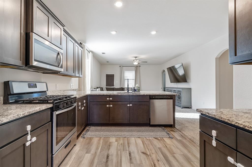 2.875% ASSUMABLE VA LOAN. MOTIVATED SELLERS! MOVE IN READY! LISTED UNDER 2024 APPRAISED VALUE!! Charming Open Concept, 3-Bedroom Home in Ponder, Texas – Krum ISD!
Welcome to this beautiful 3-bedroom, 2-bathroom home spanning 1,551 sq. ft. in the peaceful town of Ponder, Texas. Nestled in the highly sought-after Krum ISD, this home offers an ideal blend of comfort and convenience.
Step inside to an open floor plan designed for modern living, perfect for both everyday life and entertaining. The spacious living area flows seamlessly into the kitchen, which features granite countertops, ample cabinetry, and a functional layout for effortless meal prep.
The primary suite offers a private retreat with an en-suite bath, while the additional bedrooms provide flexibility for family, guests, or a home office. Outside, the backyard presents endless possibilities for outdoor enjoyment. The community includes basketball court, volleyball court, pickle ball courts, & a playground. Maple Floor Plan 1552.
Don’t miss this incredible opportunity to own a beautifully designed home in a fantastic location. Schedule your showing today!