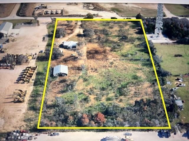 Excellent opportunity with almost 5 flat acres with immediate access to Hwy 67 in fast growing Cleburne-Keene area. This parcel is outside city limits offering the buyer many options to utilize the land:  residential, farming, agricultural, livestock, commercial, storage, multi-family, RV or Mobile Home, etc.  There are established businesses in the area. The home on the property could be rehabbed into a small office (newer roof). Excellent location. Buyer to verify with City & County on permits needed for proposed businesses. Co-op Water, Electric and Septic onsite.