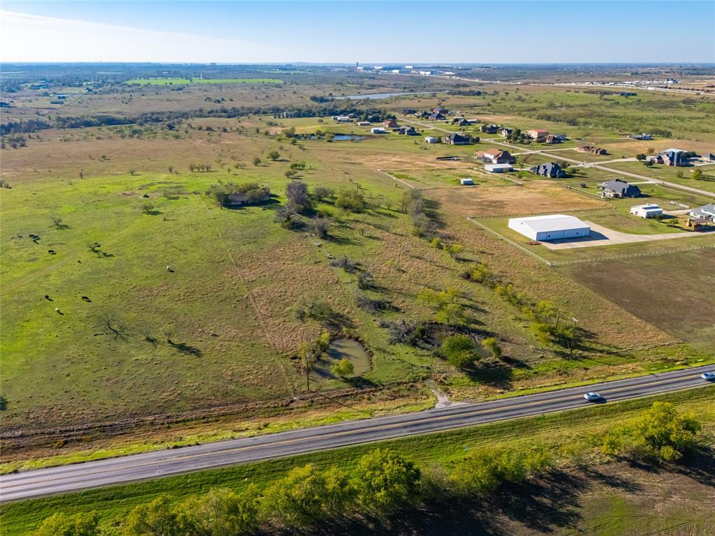Milam Creek Ranch is an exceptional ranch and investment property within the city limits of Denton. This area has an eye for future development with access or close proximity to most city utilities. The ranch is located less than 1 mile off of I-35 and just minutes from Denton and Sanger. Additionally, the property boasts panoramic views over the surrounding areas, has great symmetry, and secondary access.

LOCATION: This property is located in northern Denton County and approximately 1 mile east of I-35. There are multiple access points along Milam Rd with additional access from the neighboring Milam Creek Ranch development. The ranch is within the Denton city limits. 

TOPOGRAPHY, RANGELAND & HABITAT: The ranch displays mostly rolling topography with a high point near Milam Rd. The remainder of the property is sloping to the south as it approaches Milam Creek. Large fossiliferous limestone rocks along the creek feature an embedded variety of fossils. The range exhibits native and improved pasture with a small pocket of trees on the south end that includes elm, hedge, hackberry, and mesquite. The property contains loamy and clay soils.

WATER: A 12? city water line is on the south side of Milam Rd and ends at the neighboring development west of the property. A rural water line enters the property about midway along the frontage and continues to the northeast corner. A water well near Milam Rd is not currently being operated. The property also has 4 ponds and a section of seasonal Milam Creek. 

ELECTRICITY: An electric service line runs along the south side of Milam Rd.

MINERALS: Surface sale only.

OTHER: The 2024 taxes are estimated at $556. This property is currently zoned Rural Residential. The old home and improvements are of no value. A city sewer line is located just south of the Milam Rd exit on the east side of I-35. Ranch shown by appointment only.
