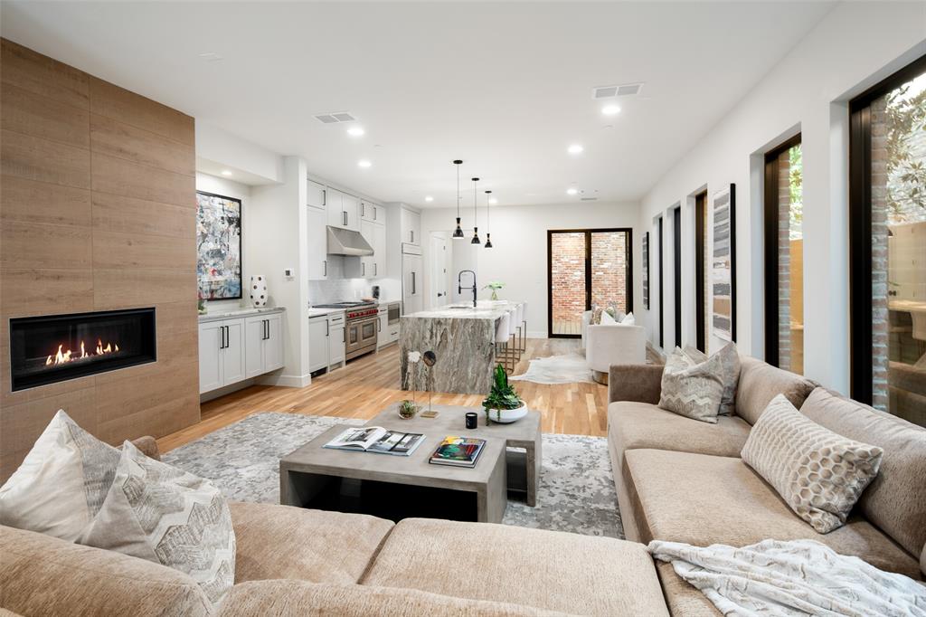 New Construction by Barnett West Custom Homes in prime University Park location with a soft contemporary-transitional finish and open floorpan. Stylish elevation with handsome brick exterior and large windows is accented by the pitched roof with standing seam detail. The first floor hosts the main living and dining areas with a large open kitchen-living-dining concept. The well-equipped kitchen features stainless appliances including a gas range, built-in refrigerator and a large center island. The spacious living room is accented by high ceilings, a fireplace, and glass doors to the patio and side yard. The courtyard with composite decking provides a wonderful place to enjoy the outdoors along with side yard and synthetic grass. The 2nd floor features the primary owner's suite with luxury bath and dual closets along with two additional ensuite bedrooms and utility room. The 3rd floor holds the 4th bedroom suite which could also be utilized as a game room or other flex space. This home offers form and function for everyday living and is an excellent opportunity in the highly acclaimed HPISD with an enviable location that is walking distance to SMU, HPMS, Snider Plaza, and the beautiful green spaces of the Park Cities.