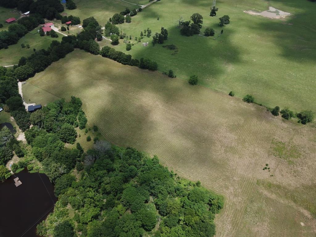 Escape to the beauty of East Texas with this stunning 12.12-acre lakefront property in Edgewood. Featuring expansive water views and approximately 500 feet of shoreline, this property offers the perfect blend of privacy, nature, and opportunity. Whether you envision building a custom waterfront estate, a peaceful weekend retreat, or an investment property, the possibilities are endless. The gently rolling terrain provides easy access to the water and creates the ideal backdrop for unforgettable sunsets and outdoor living. Conveniently located within reach of Dallas while still offering the tranquility of country life, this rare waterfront acreage is truly a hidden gem.