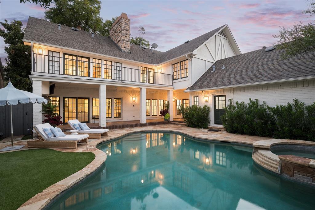 Experience luxury living at 3102 Saint Johns in Highland Park. Situated on a beautifully landscaped elevated 75x150 lot, this exceptional 4BD 6BA home spans 5,746SQFT, offering a blend of elegance and comfort. The spacious layout includes formal living and dining rooms, vaulted ceilings, a game room and a family room featuring new marble fireplaces. The chef’s kitchen has a quartzite island, high-end commercial-grade appliances, and a separate breakfast room with views of backyard oasis. The large primary suite boasts a cozy seating area with balcony access overlooking the stunning backyard, a newly updated marble shower, and his-and-her custom closets. Upstairs, find three additional ensuite bedrooms and a spacious laundry room. Several recent updates include a new fence, air conditioners, an electrical breaker, updated wiring, a hot water heater, and a filtered water system added to the kitchen. This home is designed for sophisticated living and effortless entertaining.