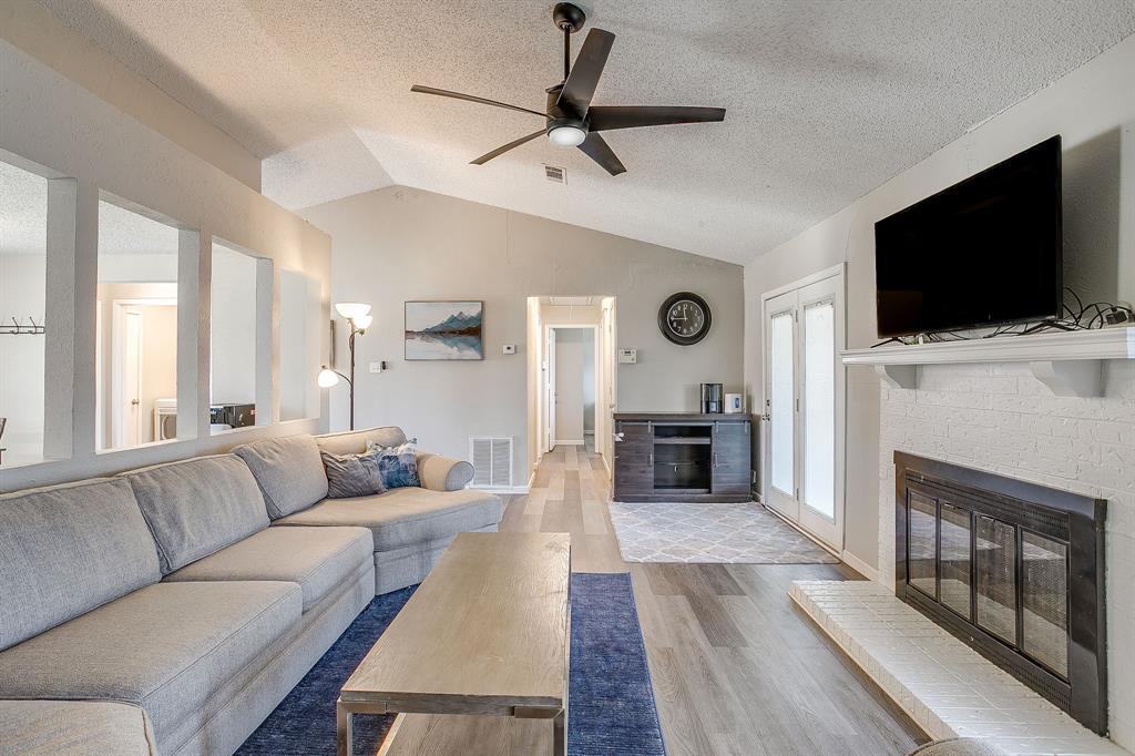 Welcome to this charming 3-bedroom, 2-bath home in the established Summerfields neighborhood of Fort Worth, located within highly sought-after Keller ISD! Featuring an open-concept floor plan with vaulted ceilings, abundant natural light, and a cozy wood-burning fireplace, this home offers the perfect blend of comfort and functionality. The spacious kitchen flows seamlessly into the dining area, creating an ideal space for entertaining and everyday living.  The private primary suite includes an en suite bath, while two secondary bedrooms provide flexible space for guests, a home office, or growing households. A standout feature is the bonus office or hobby room with private access through the garage—perfect for remote work, creative projects, a workout space, or additional storage.  Enjoy year-round relaxation in the enclosed sunroom overlooking the large backyard, offering plenty of room for pets, play, gardening, or future outdoor enhancements.
Conveniently located near neighborhood parks, schools, shopping, dining, and entertainment, this Fort Worth home provides easy access to I-35W, with Alliance Town Center, Fossil Creek, and major employers just minutes away. If you’re looking for a move-in-ready home with flexible living spaces, a spacious backyard, and a prime North Fort Worth location, this one is a must-see!