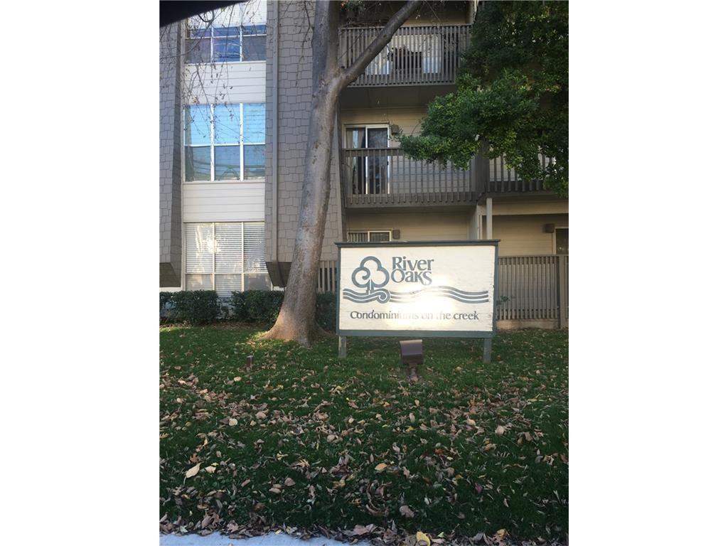 Nice first floor cornet unit, recently updated with vinyl plank flooring. Nice white appliances, counters, lights & fans. Recent bath vanity, refinished tub. Fresh paint. Large fenced patio. Located near pool courtyard and close to parking garage too! **Buyer pre-approval letter or Proof of funds to close must be submitted with all offers.**