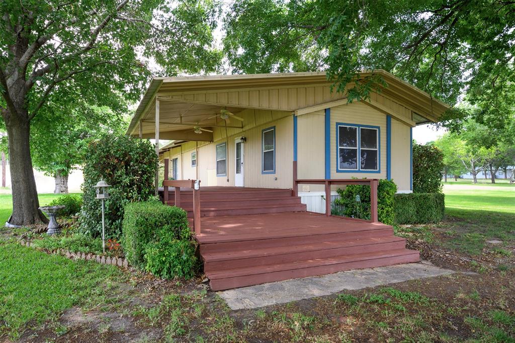 Beautiful waterfront property on Lake Bridgeport with some of the best open water views on the lake. Situated on a spacious .75-acre lot, this 2-bedroom, 2-bath home offers unobstructed sunset views, a sandy beach shoreline, and the perfect setup for summer fun. The lake is full and ready to enjoy, whether you’re looking for a weekend retreat, vacation property, or full-time lake living. A metal building provides additional garage and storage space and includes electric offering added functionality for lake toys, equipment, or workshop use. Located in one of the most desirable areas of Lake Bridgeport, you’ll enjoy peaceful waterfront living while still being conveniently close to restaurants, shopping, and town amenities.