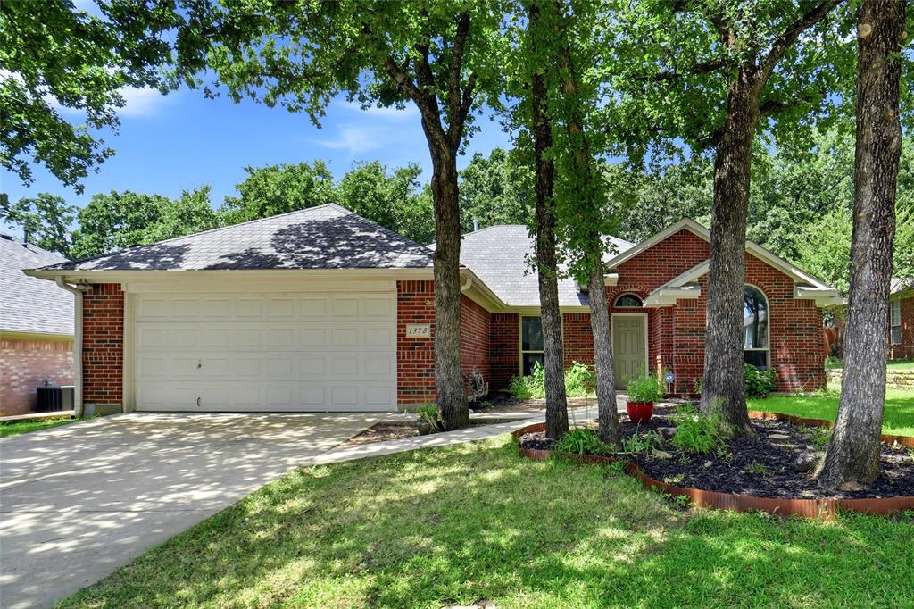 Rare opportunity to own in the highly sought after Oaks of Bellaire, where thoughtful updates, quality improvements, and timeless design come together in a home that's truly move in ready. This beautifully maintained 1 story home offers 4 spacious bedrooms and a functional floor plan designed for comfortable everyday living. Recent updates include fresh interior paint, stylish lvp flooring, beautifully renovated primary and hall bathrooms, and updated kitchen appliances that give the home a fresh, modern feel. Major improvements provide peace of mind, including a new HVAC system installed in 2023 along with new attic insulation for improved energy efficiency. Step outside to enjoy the wooded private backyard, complete with a new wood privacy fence, creating the perfect space for relaxing, entertaining, or letting pets and children play. Conveniently located near shopping, dining, parks, and major commuting routes, this home offers the perfect combination of location, comfort, and value. Don't miss your opportunity to own this exceptional home in one of the area's most desirable neighborhoods.