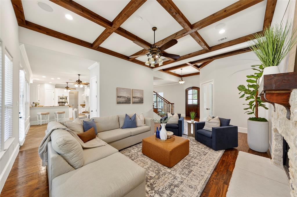 Welcome to a rare Midway Hollow gem where Timeless Design & Craftsmanship meets quiet luxury. This one-owner 4-bedroom home with Office, Media Room & Loft, 3.5 baths, and a 3-car garage sits on a beautifully treed .23-acre lot with a U-shaped driveway and a private heated swimming pool & spa. Built Texas Green for efficiency with brick, stone, and wood, this Traditional-style home has been meticulously maintained, newly refreshed, and is move-in ready.  Inside, enjoy open-beamed 10-foot ceilings, rich hardwood floors, a neutral color palette, and an open-concept layout filled with natural light from large windows showcasing peaceful, tree-lined views. The chef’s island kitchen overlooks the pool, patio, and grassy fenced backyard—perfect for everyday living and entertaining. The serene primary suite features a spa-like bath with dual claw-foot vanities, offering a true retreat.  A cherished one-owner home, thoughtfully built by a home builder for his own family, this property blends warmth, quality, and function. Ideally located minutes from Central Market, Walnut Hill Recreation Center, Love Field, and Walnut Hill Leadership Academy (K–8), it offers a lifestyle of refined comfort in one of Dallas’s most friendly, family-oriented neighborhoods. Quiet elegance. Prime location. A rare opportunity in highly sought-after Midway Hollow. Newly Added Upgrades are: Epoxy garage floor, Pool Heater, new concrete Decking surround topped with Cool Deck for comfort.