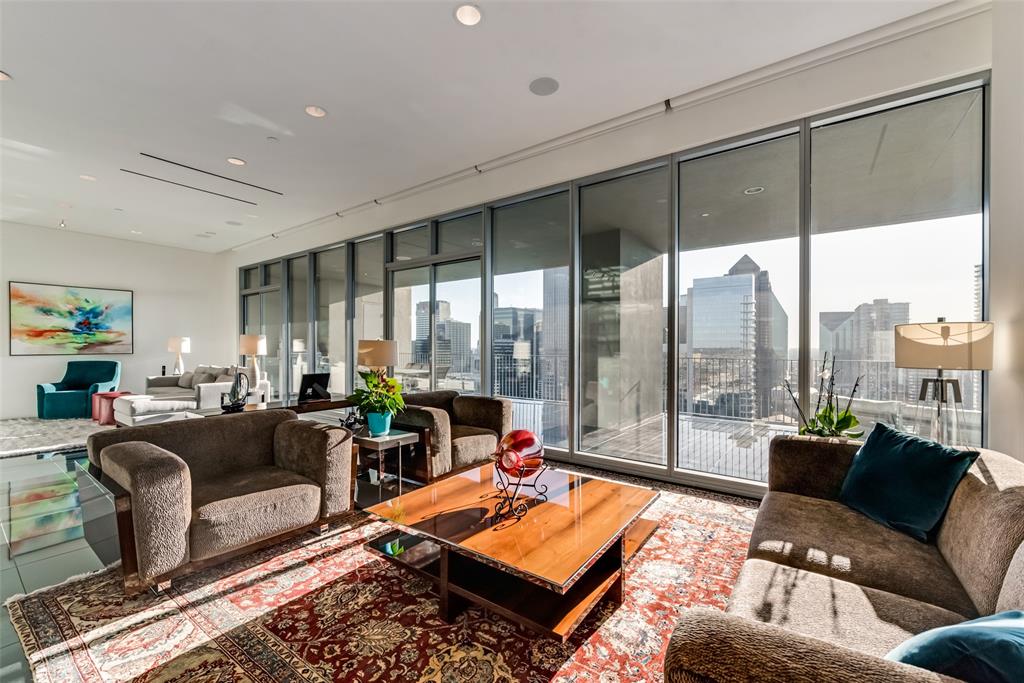 Step into this Extraordinary High-rise with a wall of windows overlooking Downtown Dallas, Theater & Arts Center, Museums, and Klyde Park or step out to a full length covered patio for this amazing view. Remolded kitchen with Quartz countertops, wine cooler, gas range top, microwave, built in Fridge, and ready for entertainment with dining area, and two living areas all overlooking the balcony. Primary bedroom has a luxurious ensuite with custom wood closet designed for that organized buyer. Second bedroom has a wall of storage to keep things neat and in place and the ensuite is luxurious with a walk- in closet The ceilings are 11 feet tall. The flooring is granite. The balcony has an outdoor kitchen with a grill, refrigerator and storage closet. There is parking garage in basement and a 50 square feet- controlled air storage room.