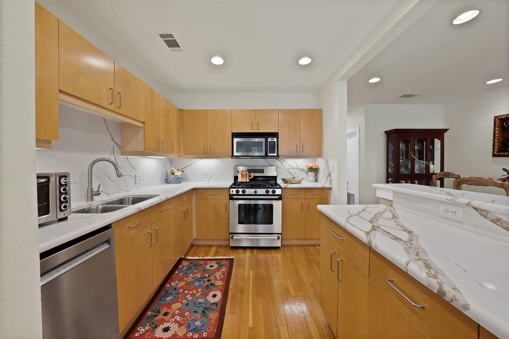 *Price Adjustment* Seller to pay first 3 months of HOA fees with acceptable offer!
Upstairs loft adds additional square footage on top of what is listed in MLS. Buyer to verify exact square footage. 
Live in the center of it all at Addison Circle! This beautifully updated two-story condo offers stylish, low-maintenance living in one of North Dallas’ most walkable and vibrant neighborhoods. This unit is the only unit in the building with an upstairs loft that can be used as an office or seating area and two balconies. Inside, you’ll find a thoughtfully renovated kitchen with ceiling-height cabinetry, soft-close drawers, and modern finishes—perfect for everyday living or entertaining. The master bath includes a stand-up shower dual-vanity, and a jacuzzi-tub. 
Enjoy a clean, carpet-free interior and a move-in-ready space that needs nothing. The HOA provides exceptional value by covering all utilities except electric, and residents benefit from convenient amenities like a dedicated bike storage room.
Step outside and you’re just moments from popular dining, parks, and year-round events, with the upcoming DART Rail station only two blocks away. Residents also have access to the Addison Athletic Club for a one-time $10 fee. Gated parking included (space #205).
A perfect blend of comfort, convenience, and lifestyle—schedule your showing today!