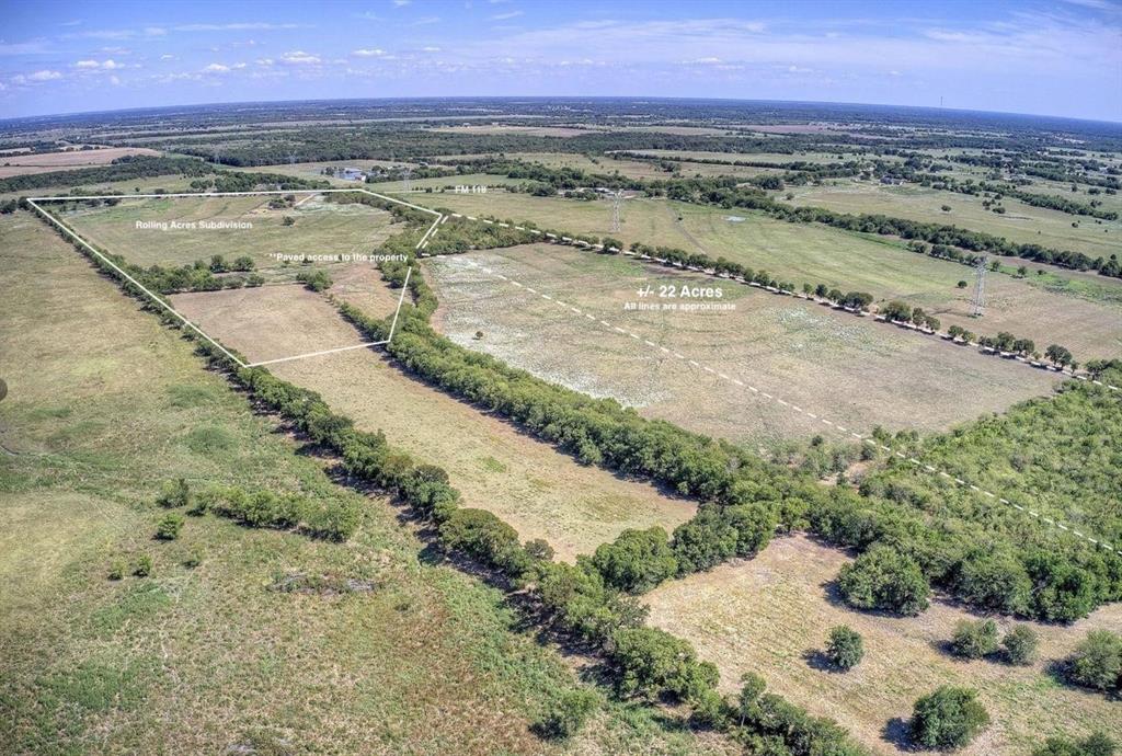 Located just north of Greenville and approximately five miles east of I-30, this ±22-acre tract offers a versatile opportunity for buyers looking to build, invest, or enjoy more space in a growing area of Hunt County.

Surrounded by established 1+ acre homesites, the property sits within an active rural residential area, making it well-suited for custom homes, barndominiums, manufactured homes, or small-scale development.

Access is provided by Rolling Lane, a paved county-maintained road, with Shady Grove water and underground electric available at the property line—helping reduce upfront costs and simplify the building process.

The land features level topography with a mix of open pasture and scattered trees, allowing flexibility in layout and use, whether for a private homesite, multiple residences, or recreational use.

Located outside city limits with no HOA, this property offers the freedom to build and use the land without many of the restrictions found in traditional neighborhoods.

With continued growth expanding from Greenville and convenient access to I-30, this tract presents a strong opportunity for both immediate use and long-term potential.