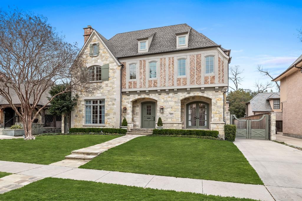 Nestled on an oversized lot walking distance to Flippen & Fairfax Park, this custom-built home exudes elegance! The showstopper begins in the dazzling entry leading to the formal living adorned with de Gournay wall coverings & fireplace, a generous formal dining room, a handsome study with built-ins & large family room with fireplace. The gourmet kitchen is clad in gorgeous marble and top-of-the-line appliances with a breakfast room overlooking the lush backyard with drivable turf, putting green, pool & spa. Upstairs each bedroom is graciously proportioned with private baths & generous closets. The primary bedroom with vaulted ceilings & a large sitting area, invites you to unwind & retreat to the renovated bathroom. The upstairs library offers custom bookcases, ideal for showcasing collections, art, & additional storage. The oversized laundry offers more storage & an additional ice maker. The quarters gives you flexibility with a fifth bedroom, kitchenette, bathroom & ample storage.