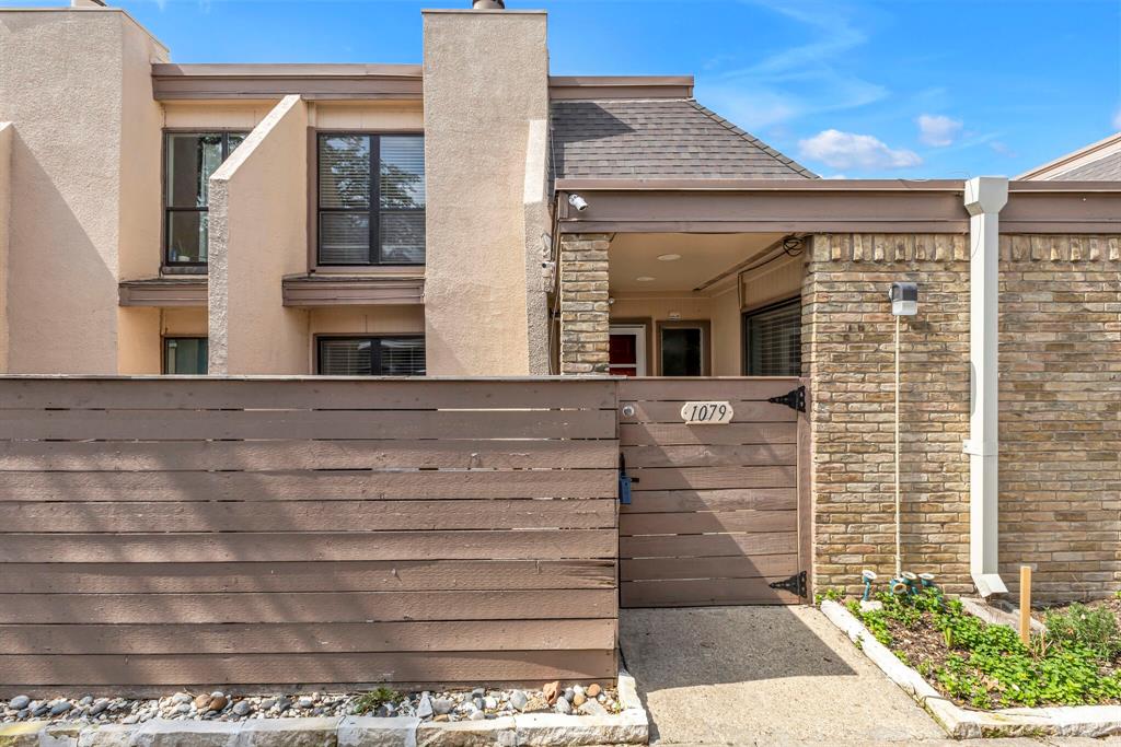 A townhome granite wonderland. Step into this townhome decorated with granite and tile for most of the house. This is a 2 bedroom and 2 bath and is perfect for a new family with easy access to all that North Dallas offers. The townhome comes with a small front fenced patio, perfect for the weekend cookout grill or for your loving pets to spend the day outside. The fireplace is comes decorated with green granite. The floor is of hard tile and the kitchen has an electric cooktop. Upstairs has a small closet that was added. The washer, dryer and refrigerator are negotiable.
