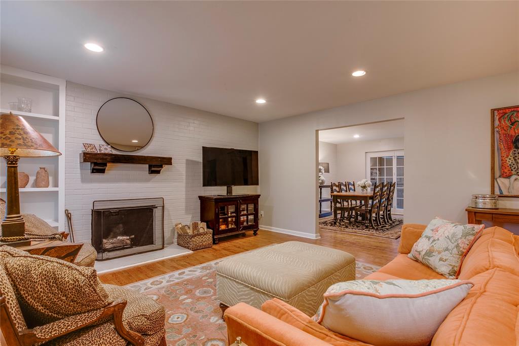 Step into this beautifully updated 3-bedroom, 2-bath, first-floor condo that perfectly blends style, comfort, and convenience. Nestled in the heart of  vibrant Preston Hollow and minutes to downtown, you will love the convenient location of this home.

Inside enjoy gleaming wood floors, large windows and an open layout creating a warm vibe throughout. The recently renovated kitchen is a true centerpiece, featuring sleek quartz countertop, a breakfast bar that opens to the living area, tons of cabinetry and stainless steel appliances with plenty of space to entertain. The living room exudes charm with its built-ins, a gas fireplace framed by a wood-beam mantle, and a touch of character with exposed brick.

The oversized bedrooms offer plenty of room to unwind, with abundant closet space to keep things organized. The primary suite includes a private bath for your comfort. Outdoors, a full-length covered patio provides the perfect spot for morning coffee or evening relaxation, complete with an additional storage closet for added convenience.

This condo also comes with an assigned private parking, extra guest parking, and direct access to the Northaven Trail—perfect for walking, jogging, or biking. Plus, the HOA takes care of water, electricity, gas, trash, and pool, making life here as easy as it is enjoyable.
This is the perfect opportunity to claim a stylish, low-maintenance home in one of Dallas' most desirable locations. Don’t miss it!