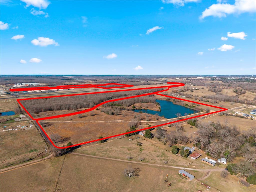 PRIME COMMERCIAL OPPORTUNITY AWAITS NEAR MOUNT PLEASANT REGIONAL AIRPORT
Exception potential with this commercial land offering.  Four distinct tracts with valuable road frontage.  Convenient to industrial and residential.  

Additional TRACTS Available