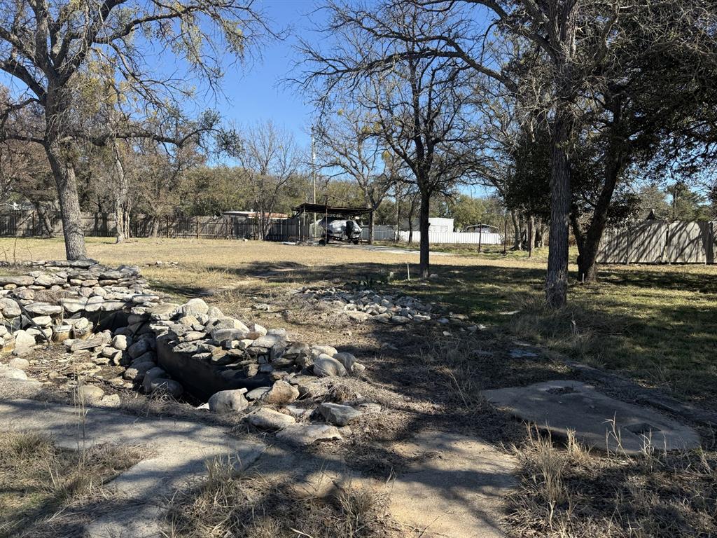 Excellent opportunity in the Harbor Point community! This group of six lots located on Bounding Main sits directly across the street from the lake and just down the block from the community boat ramp, offering excellent access for boating, fishing, and lake recreation.
The property can be purchased together as one large tract or divided into smaller individual lots. Water and electric are available. Potential septic tank can be investigated! The land is partially cleared and fenced, providing a great starting point for building or creating your ideal lake getaway. Even more opportunity awaits with five additional neighboring lots also available for purchase individually, allowing the potential to expand your footprint in this desirable community. Harbor Point property owners enjoy HOA amenities including a community pool and parks, adding to the appeal of this lake-area property. Reach out for more information today! Whether you're looking to build, invest, or secure multiple lots near the water, this is a rare opportunity to own a flexible property in Harbor Point close to the lake and community amenities.