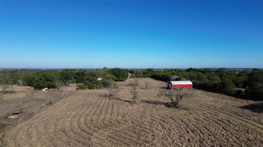 Build your dream lifestyle on this 3.6-acre homesite located at the end of a quiet cul-de-sac in Granbury, TX. This fully fenced property offers privacy, space, and flexibility—ideal for a custom home, barndominium, manufactured home, RV setup, or weekend retreat.

With electricity and a water meter already in place, this property is ready for your vision, saving you time and upfront costs. The gently sloping terrain and wide-open Texas skies create a peaceful country setting while still being conveniently located near Granbury’s shopping, dining, and Lake Granbury recreation.

Enjoy the freedom of light restrictions, giving you the ability to design and use the land your way—whether you're looking for a primary residence, investment property, or recreational escape.

Don’t miss this rare opportunity for acreage, privacy, and convenience all in one!

Excludes red storage building and RV.