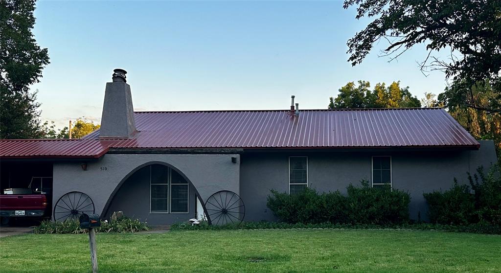 This is a retreat that combines cozy living with unique outdoor features and a fantastic outbuilding perfect for entertaining or extra living space.

The main house has two comfortable bedrooms and one and a half baths. There is a sperate office area off of living room and the living area has a wood burning fireplace perfect for winter. 

Step outside into a lush, green oasis filled with mature plants and a lovely koi pond. A picturesque grapevine-covered arbor leads you from the main house to the separate living space in the back that is great for for gatherings, a guest suite, or hobby area with it's own half bath and wood burning stove. The flooring is from the old skate rink which makes it even more unique! There is also a storm shelter between the 2 living spaces for peace of mind.

This property truly offers a blend of comfortable living and unique extras, perfect for anyone looking for a bit of character and a lot of charm in Seymour!