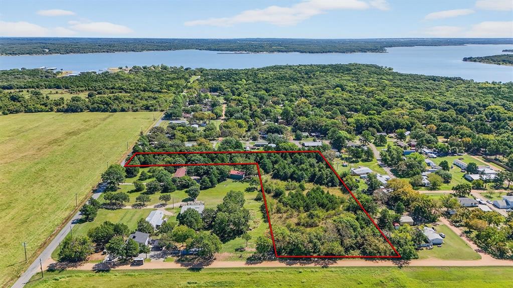 Discover 5.5 acres of heavily treed land with dual frontage on both Big Mineral Road and Old Sadler Road. This unique tract offers a private, wooded setting while still providing easy access. Located just minutes from Big Mineral Marina, it’s the perfect spot for those who enjoy lake life and boating adventures. Whether you envision a secluded weekend retreat, a future homesite surrounded by mature trees, or a recreational getaway close to Lake Texoma, this property delivers both convenience and natural beauty.