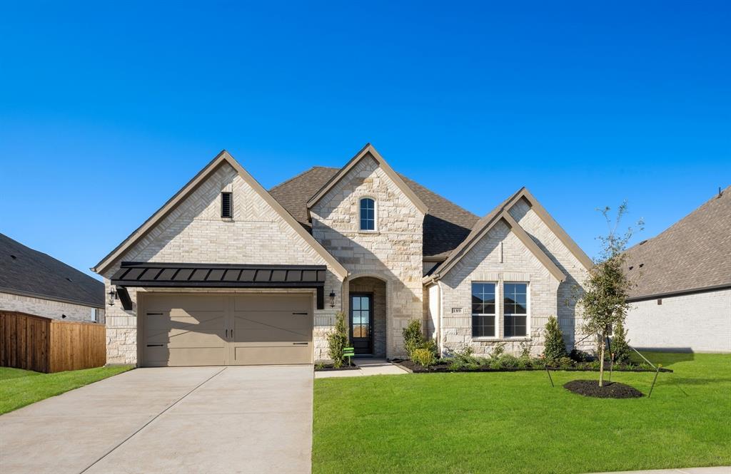 MLS# 20985252 - Built by UnionMain Homes - Ready Now! ~ This stunning new construction single-family residence in the Myrtle Creek subdivision offers 2,786 square feet of thoughtfully designed living space, featuring 4 primary bedrooms and 3 full bathrooms. Anticipated to be completed by November 1, 2025, this traditional-style home boasts an open floor plan, perfect for modern living. Enjoy luxurious details including granite countertops, a kitchen island, decorative lighting, and walk-in closets.  The property also includes cable and high-speed internet availability, along with ENERGY STAR qualified heating and cooling systems for optimal comfort. Outside, the landscaped yard features a covered patio, rain gutters, and a sprinkler system. Located within the Waxahachie ISD, this home is a perfect fit for everyone seeking a vibrant community. With a 2-car garage and easy access to nearby schools, this residence is a must-see!