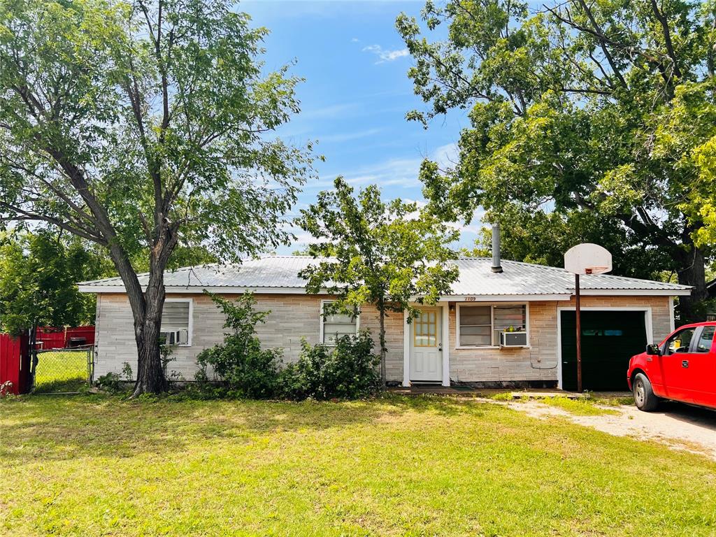 This would be a fantastic rental or starter home!  Three bedroom one bath with a nice screened in porch to enjoy your morning.  Updates to plumbing and bathroom.  New flooring except for one bedroom.  Wood burning stove in living room recently removed when replacing carpet, but is in garage and will stay.  King size bed will fit in master.  Attached garage.  Nice size back yard with storage building that has electricity.
