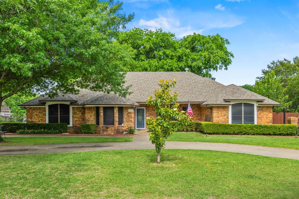 Lake Ridge Rd in Glenn Heights. Situated on nearly an acre, this well-maintained property backs to a scenic fishing pond and features a sparkling gunite pool and spa, creating the ultimate backyard retreat for relaxing and entertaining. A large detached shop provides excellent space for hobbies, storage, projects, or recreational equipment. Recent upgrades include an energy-efficient Trane HVAC system with a variable-speed blower motor installed approximately three years ago, a heated and cooled attached garage, and a Blaze King fireplace insert that adds warmth and efficiency to the living area. Inside, you'll find spacious living spaces filled with natural light. The inviting family room flows into a well-appointed kitchen with abundant cabinet space and a bright dining area that connects seamlessly to the sunroom, enhancing indoor-outdoor living. The private primary suite offers a peaceful retreat with a large walk-in closet, soaking tub, and separate shower. Two additional bedrooms provide comfortable accommodations, while the versatile fourth bedroom can function as a home office, guest room, nursery, workout room, or additional bedroom. Enjoy peaceful pond views from your backyard while benefiting from convenient access to I-35, I-45, shopping, dining, parks, and recreation. Combining a fishing pond backdrop, resort-style outdoor amenities, valuable updates, flexible living spaces, and nearly an acre of land, this property offers a rare opportunity to enjoy privacy, comfort, and convenience in one exceptional home. Contact us today to schedule a private showing and discover how this property could be the perfect place for your next move.