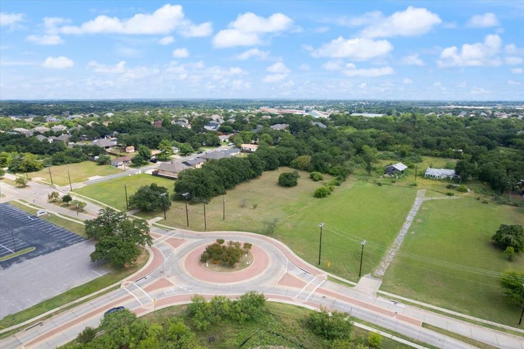 Rare opportunity in the heart of Kennedale! Situated on 2 prime acres, this property offers incredible versatility with zoning currently designated as residential yet holding exciting potential for commercial use. Located on a highly visible thoroughfare with strong daily traffic counts, this parcel is ideally positioned for those seeking a home site with land or an investment opportunity that could evolve into a future business location.
For those envisioning a residential retreat, the expansive acreage provides ample space to design and build your dream home with room for a shop, pool, or guest house. Mature surroundings and generous lot depth offer privacy and the chance to enjoy a country feel while remaining only minutes from city conveniences. Kennedale is known for its small-town charm, excellent schools, and proximity to Fort Worth, Arlington, and major highways, making it an ideal place to establish roots.
For those considering commercial or mixed-use potential, the location cannot be overstated. With consistent drive-by exposure, this property lends itself to a variety of uses—such as professional offices, a boutique business, daycare facility, wellness center, or other community-oriented ventures—subject to city approval. The visibility ensures strong branding and customer recognition for future operations.
Whether you’re an investor looking for property with growth potential, a builder seeking a unique homesite, or an entrepreneur searching for the perfect location, this 2-acre tract offers endless possibilities. With frontage along a busy corridor and quick access to I-20, 287, and 820, the site connects seamlessly to the greater DFW Metroplex.
Don’t miss out on this versatile property in a thriving community. Explore the possibilities of residential living, business opportunity, or both—all in one exceptional Kennedale location.