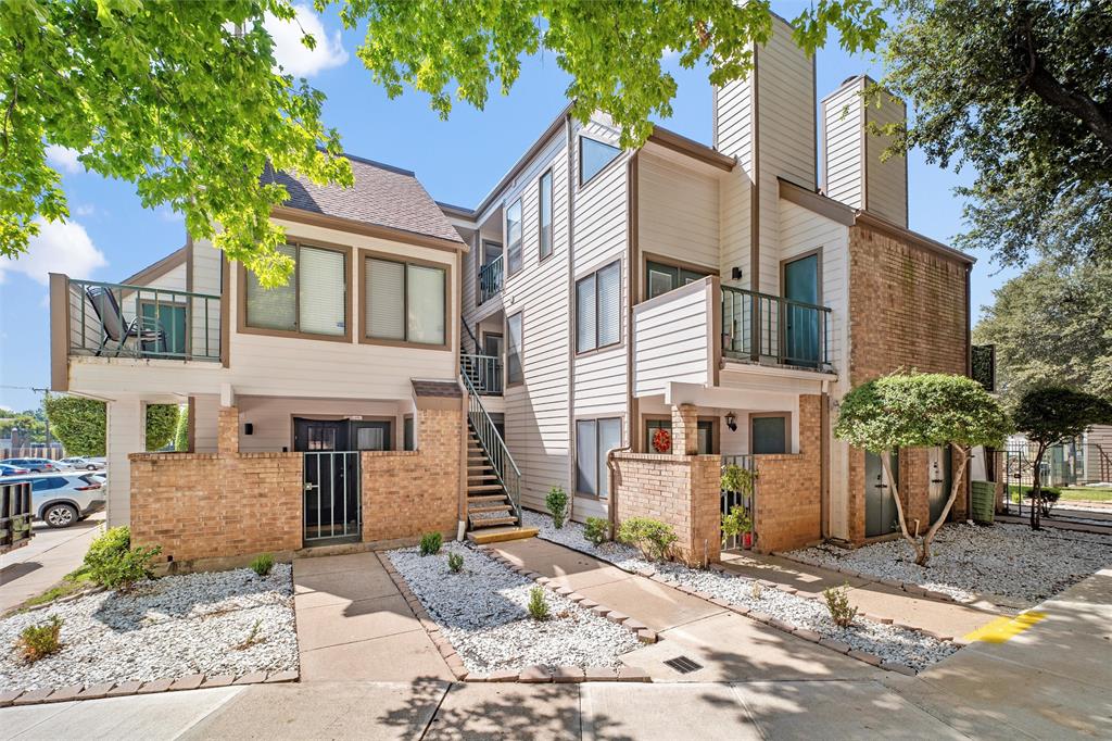 Wanting or needing a place conveniently located to everything DFW has to offer? This nice condo is located near HWY 360 so you've got easy access to highways to DFW Airport, Arlington Entertainment District, Dallas, Fort Worth and so much more! An upstairs unit, this condo offers just enough space for one's needs! One spacious bedroom offers two separate closets, access to the washer-dryer and ensuite bathroom. The  vaulted ceiling in the living area makes the space seem larger than it is. Plenty of windows let the sunshine in, too! Laminate flooring is found in the living and dining areas. Also, there's a cozy loft space up the carpeted staircase that would make a great home office or exercise room, or a craft room! And, there's a nice balcony off the living room to easily get some fresh air! The condo is located towards the front of the complex and offers a designated parking space just steps away from the condo! And, there are community pools, a tennis court and exercise room, too! HOA covers water, sewer and pest control! Come check it out!