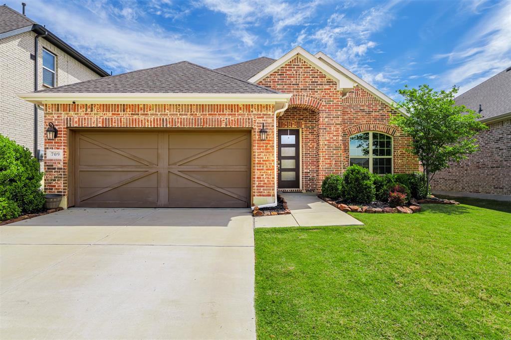 Welcome to Oak Point, Texas—just north of Dallas and minutes from Lake Lewisville—offering convenient access to the greater DFW metroplex, including both Dallas and Fort Worth. Located within Little Elm ISD in a growing lakeside community, this home provides access to everyday shopping and dining throughout the Little Elm, Frisco, and Denton corridor, including a Costco less than four miles away. The area continues to see steady growth, with development extending from Frisco, including the PGA district and surrounding expansion. A new high school is currently planned for 2027, supporting continued growth in the area. Inside, the home offers a flexible layout designed for practical, everyday living. Upon entry, a large formal dining area can function as a second living space, office, or entertaining area. The kitchen sits at the center of the home with granite countertops, a large island, and walk-in pantry, opening directly to the main living area where a fireplace creates a comfortable gathering space. A secondary dining area sits just off the kitchen, along with additional seating at the island for daily use or entertaining. The primary suite is privately situated and features dual sinks, a spacious walk-in shower, and ample storage. Two additional bedrooms offer flexibility for guests, family, or a home office. Additional features include 6-inch exterior walls for improved energy efficiency, a tankless water heater, and a built-in pest control system accessible from the exterior. The backyard includes a covered patio and extended concrete seating areas, creating multiple outdoor spaces for relaxing or entertaining, along with a board-on-board fence for added privacy. VA assumable loan available at approximately 4.25% interest rate for qualified buyers. Consult with your lender or agent for details.