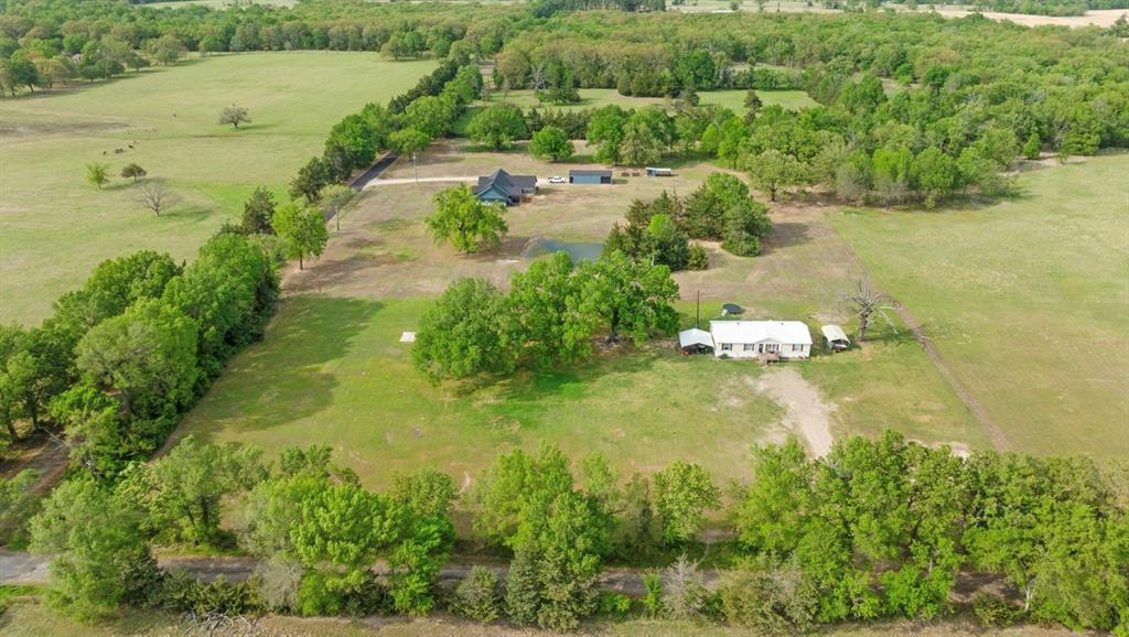 Charming home located in Blossom, TX in the highly desirable Prairiland School District!  This 4 bedroom, 2 bath home has an open floor plan and has recently had a new metal roof installed.  The home sits on the corner of CR 44850 and CR 44880 giving the 3 acres of land ample road frontage and room to build another home if desired. Enjoy country living at its finest!!!