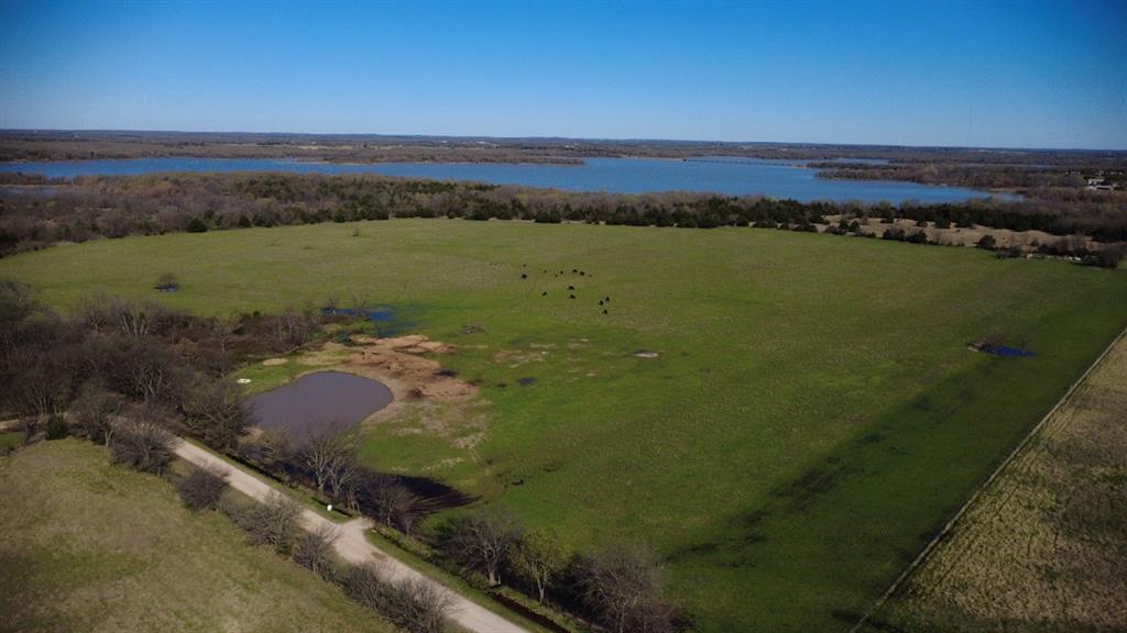 Exceptional 40.393 Acre Property Adjacent to Lake Ray Roberts Wildlife Area
Prime Investment Opportunity in Tioga, Texas
Discover a rare opportunity to own 40.393 acres of prime land joining the Texas Parks & Wildlife Management Area at Lake Ray Roberts, just minutes from the thriving town of Tioga, Texas. This property currently operates as productive cattle pastures and benefits from an agricultural tax exemption, offering significant savings for owners.
Enjoy direct access onto the wildlife management area and the pristine shores of Lake Ray Roberts, making this land ideal for outdoor enthusiasts, hunters, or anyone seeking a tranquil retreat. Located within Grayson County’s Lake Ray Roberts Planning & Zoning and the City of Tioga ETJ, this parcel also holds incredible development potential for rural residential projects as the area continues to grow rapidly.
Whether you're investing for future development or seeking a private ranch with unique recreational access, this property combines natural beauty, strategic location, and flexible land use. Don’t miss your chance to own a piece of Texas near one of the state's most desirable lakes.