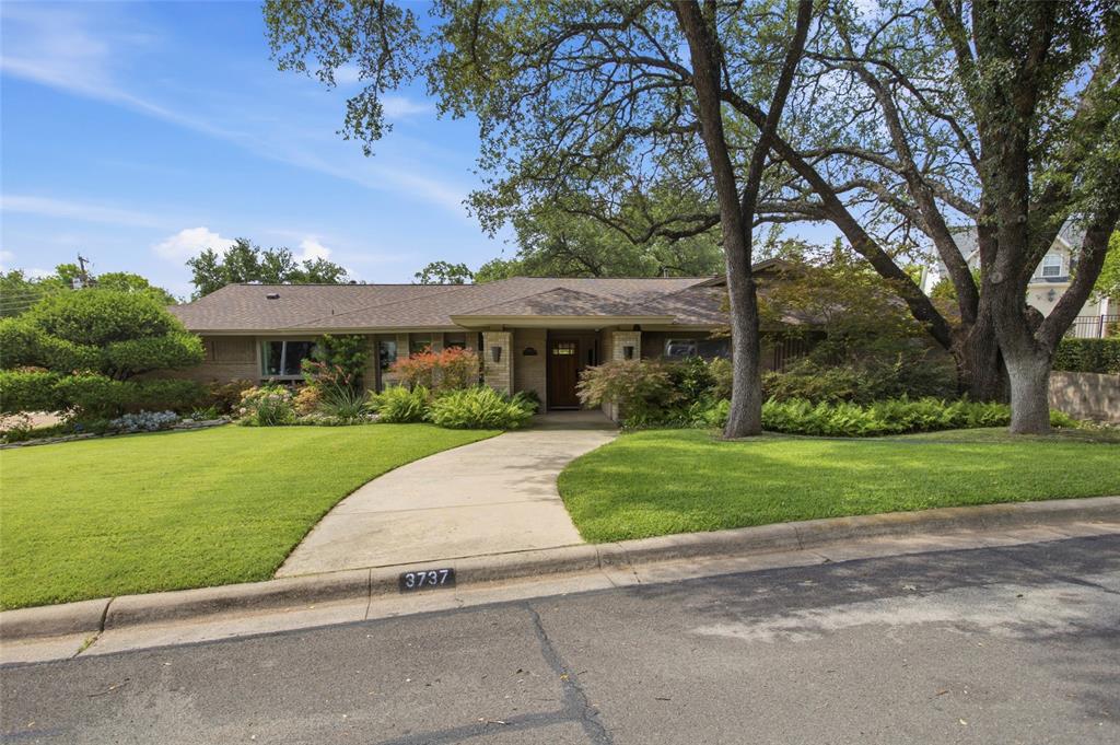 Located in the heart of Overton Park, this exceptional ranch-style home offers 4,056 square feet of thoughtfully designed living space, featuring 4 bedrooms and 3 bathrooms. Blending timeless charm with modern amenities, this home is ideal for both everyday living and entertaining. The versatile floor plan includes two spacious living areas, a game room, and a formal dining room anchored by a custom entertaining bar with dual built-in wine refrigerators. The kitchen is well-appointed with stainless steel appliances featuring a built-in gas range, double ovens, ample storage space and a large island with quartz countertops. Step outside to the private backyard retreat, where a sparkling pool, covered outdoor living area, built-in grill, fireplace, heaters, and a surround sound system extending throughout the patio and pool area create the ultimate setting for year-round enjoyment. Situated on a generously sized lot, the expansive backyard offers substantial space for recreation, relaxation, and entertaining. Additional highlights include a climate-controlled 2 car garage with epoxy flooring and an attached 3 car carport. Located in one of Fort Worth's most sought-after neighborhoods and zoned to Overton Park Elementary, this property offers an exceptional opportunity in a premier location.