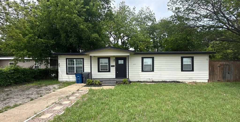 Excellent opportunity in a prime location just 10 minutes from Downtown Dallas! This property offers incredible potential and is ready for your personal touch, making it an ideal investment property, rental, or forever home. The kitchen features stone countertops, a center island with breakfast bar seating, a single-basin sink, and an open-concept layout overlooking the spacious living area—perfect for entertaining family and friends. Multiple living spaces provide flexibility for relaxation, work, or recreation. Step outside to an open patio overlooking a private backyard shaded by mature trees and enclosed by an 8-foot privacy fence, creating a great space for outdoor enjoyment. Conveniently located with easy access to major highways, shopping, dining, and entertainment destinations, this home combines location, value, and opportunity. Don't miss your chance to make it your own—schedule your showing today!