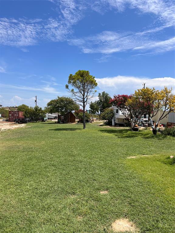 Opportunities like this are getting hard to find in this area, with very few lots currently available. This 1.25-acre property stands out as one of the larger tracts, offering extra space and flexibility. Septic and electricity are already in place, and the property has access to water. Sitting at a higher elevation, it provides nice views and an open feel. A peach tree is already on site, and the seller has planted a few additional trees. With no zoning and no known restrictions, there’s potential for a variety of uses; build a home, bring in a mobile home(s), create a mother-in-law setup, add multiple structures, or even explore small business possibilities. Buyer to verify all intended uses.