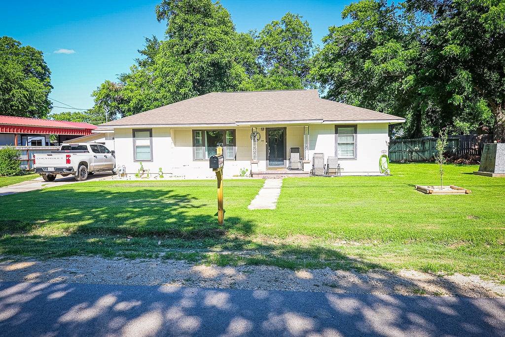 Sometimes life happens and people have to change their plans! These sellers are very motivated.  This well-maintained 3-bedroom, 2-bath home offers space, comfort, and numerous recent improvements. Inside, you’ll find a spacious layout featuring both a living room and a large bonus family room, providing plenty of space for entertaining, relaxing, or everyday living. Recent updates include new flooring, freshly painted cabinetry, a new driveway, and additional improvements throughout the home. The bedrooms are generously sized, and both bathrooms have been tastefully updated. The kitchen offers abundant cabinet and counter space, while the large living areas provide flexibility for growing families, guests, or a home office setup. Outside, enjoy a sizable yard with mature shade trees and plenty of room for outdoor activities. Move-in ready and full of charm, this property combines functional living space with valuable updates. Schedule your private showing today!