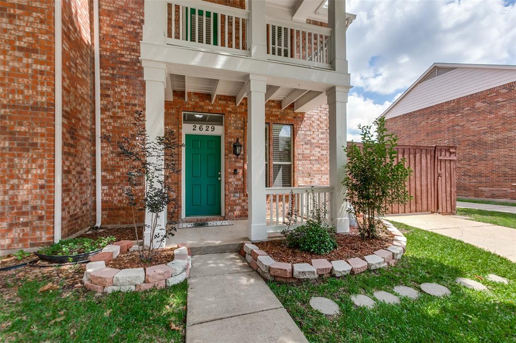 Beautifully updated home in East Plano offering comfort, convenience, and low-maintenance living. Ideally situated with easy access to IH-75 and George Bush Turnpike, this home places you minutes from major shopping, dining, and entertainment, including The Shops at Legacy East and the redevelopment area around Collin Creek Mall. Inside, you’ll find an inviting open-concept floor plan with fresh interior paint throughout and new flooring installed in November 2025. The home features major recent upgrades, including a new HVAC system installed in 2026 and a new water heater installed in 2024. A water softener is also included, adding everyday comfort and value. Both upstairs bedrooms feature private full bathrooms with newly installed walk-in showers, rain shower heads, and handheld faucets, creating a clean and modern retreat. The layout is functional, private, and ideal for comfortable daily living. Step outside to a large private backyard designed for little to no maintenance. The rear covered patio provides a great space to relax, grill, or entertain. The property also includes an electronic gate, private parking for at least six vehicles, and a detached two-car garage — a rare and valuable feature for this area. With its updates, location, private parking, and low-maintenance outdoor space, this East Plano home is move-in ready and offers a strong combination of lifestyle and convenience.